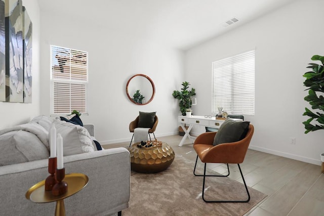 living area featuring light hardwood / wood-style flooring