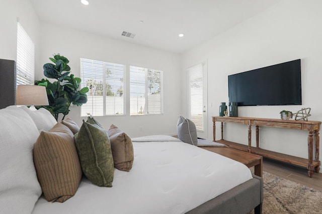 bedroom featuring wood-type flooring