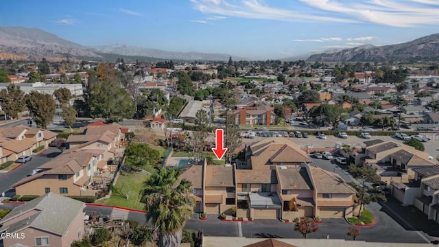 drone / aerial view featuring a mountain view