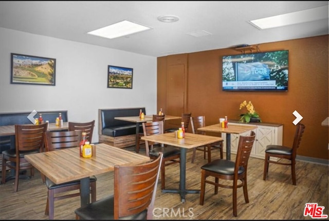 dining room featuring wood-type flooring