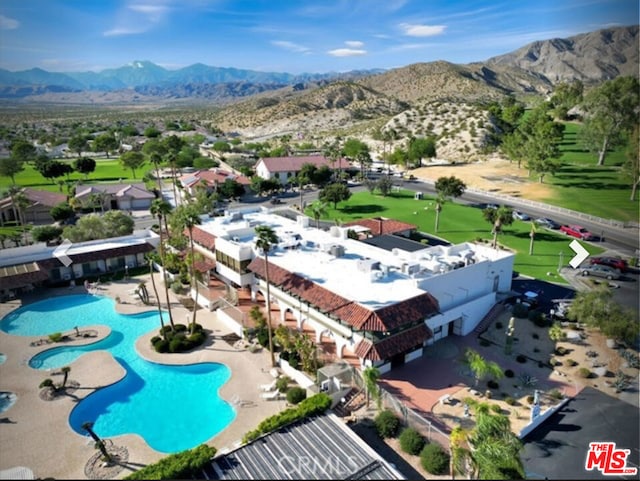 drone / aerial view featuring a mountain view