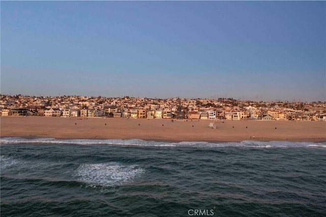 water view featuring a beach view