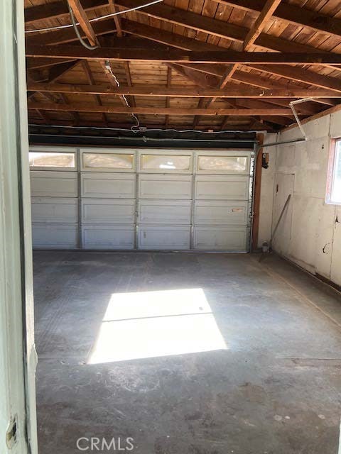 garage featuring wood ceiling