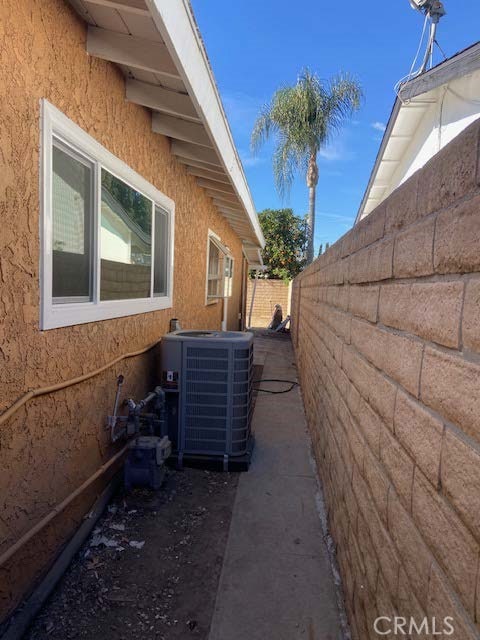 view of home's exterior featuring cooling unit