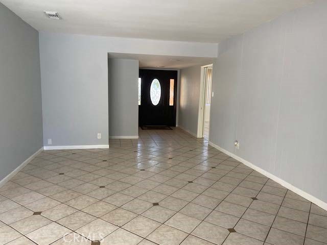 view of tiled foyer entrance