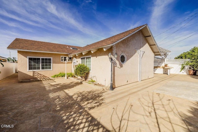 back of house featuring a patio area