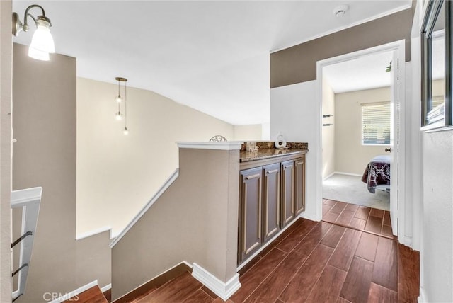 corridor featuring lofted ceiling