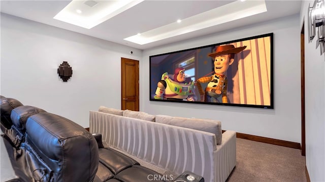 home theater room with carpet flooring and baseboards