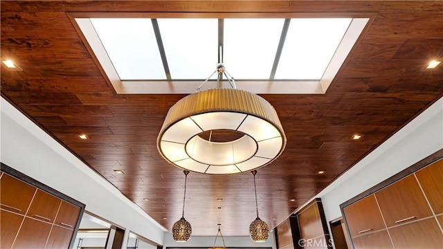 interior details with wood ceiling and a skylight