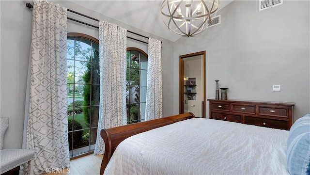 2 Thomas Rd, Ladera Ranch, CA 92694 - bedroom featuring wood finished floors, a chandelier, and access to exterior