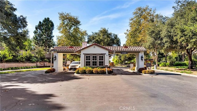 exterior space with a carport