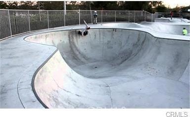 2 Thomas Rd, Ladera Ranch, CA 92694 - view of swimming pool featuring fence