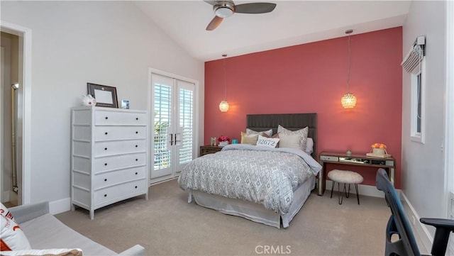 carpeted bedroom with high vaulted ceiling, access to exterior, a ceiling fan, and baseboards