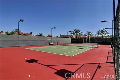 view of tennis court with basketball court