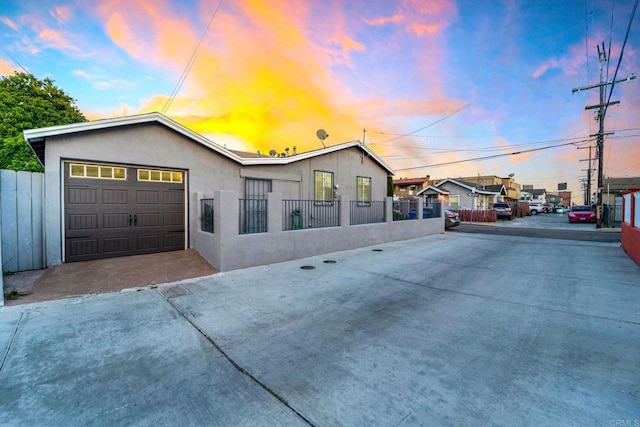 view of front of property featuring a garage