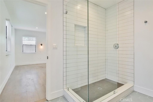 bathroom featuring tiled shower