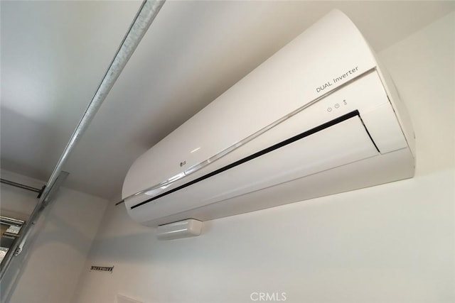 room details featuring a wall mounted AC