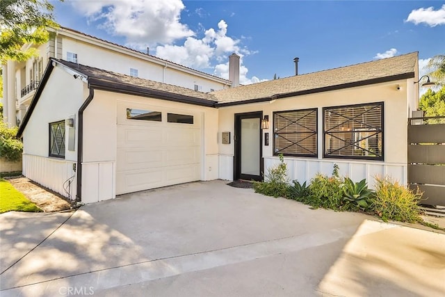 view of front of property with a garage