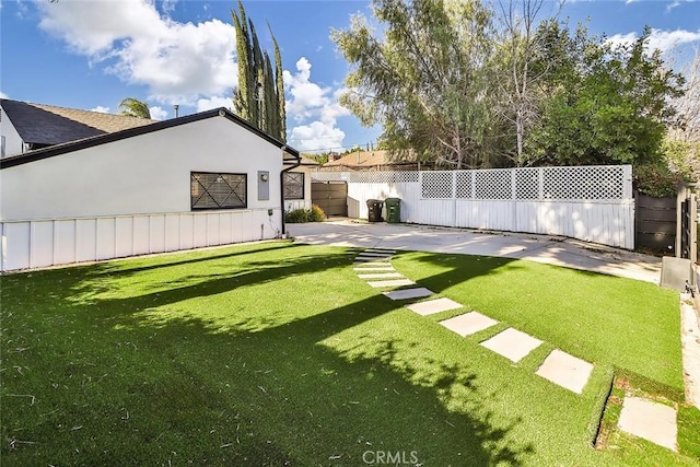 view of yard with a patio area