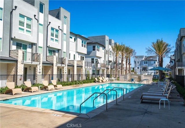 view of pool featuring a patio