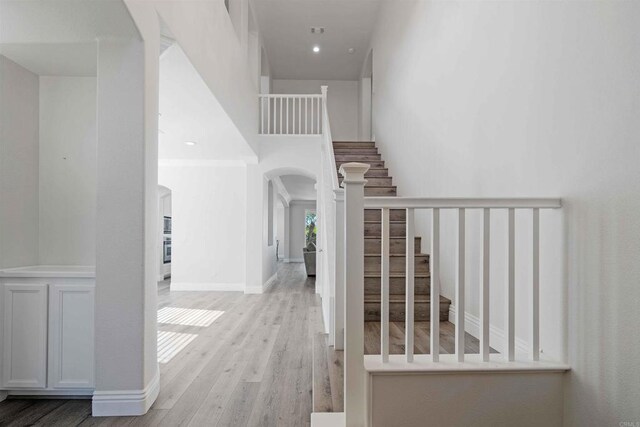 hall with light wood-type flooring