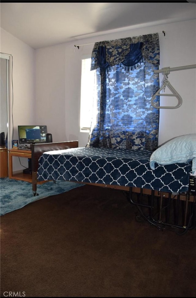 bedroom featuring carpet flooring