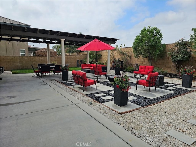 view of patio / terrace with an outdoor living space and a pergola