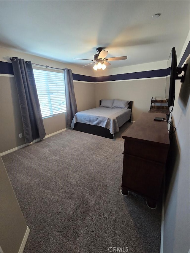 bedroom with ceiling fan and carpet floors