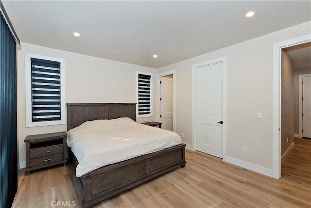 bedroom featuring light wood-type flooring