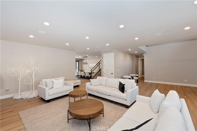 living room with light hardwood / wood-style floors