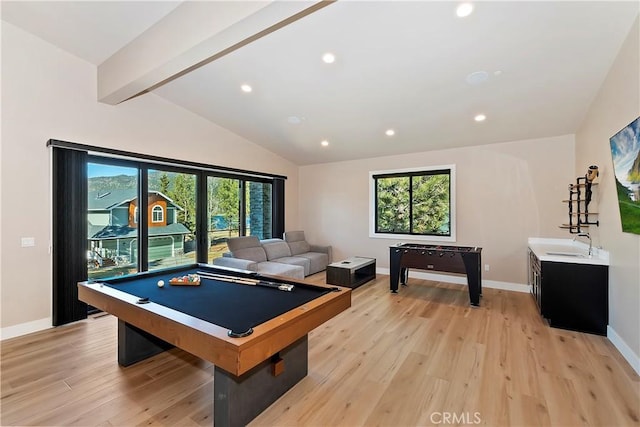 recreation room with vaulted ceiling with beams, pool table, light hardwood / wood-style flooring, and sink