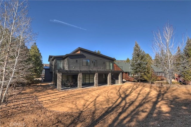 back of house featuring a patio area