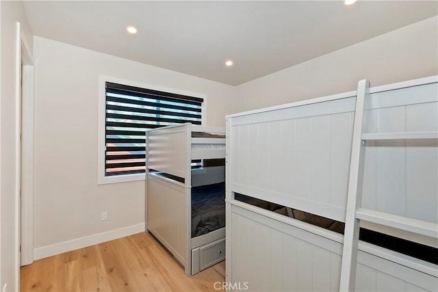 bedroom with light wood-type flooring