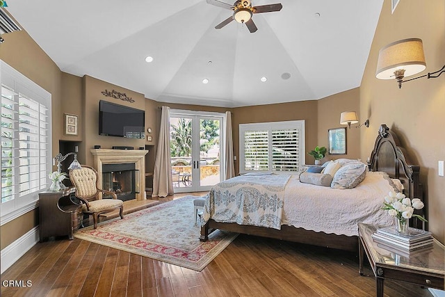 bedroom with ceiling fan, lofted ceiling, hardwood / wood-style floors, and access to outside