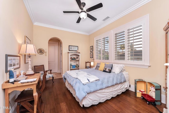 bedroom featuring ceiling fan, dark hardwood / wood-style flooring, and ornamental molding