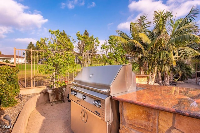 view of patio with a grill