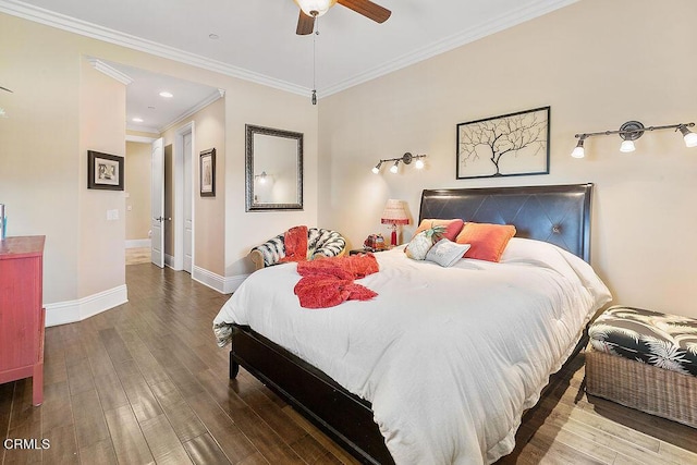 bedroom with ceiling fan, crown molding, and hardwood / wood-style flooring