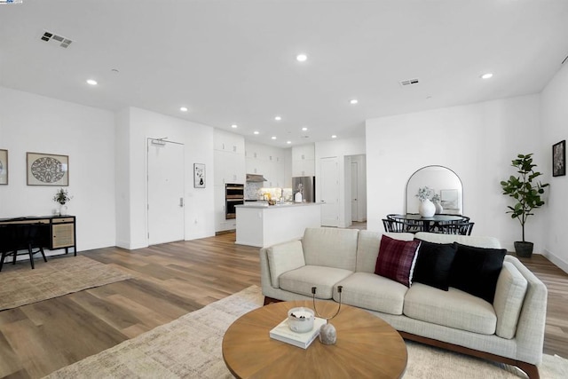 living room with light wood-type flooring