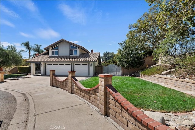 view of front facade with a front lawn and a garage