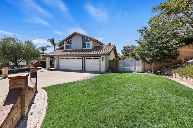 front of property with a garage and a front lawn