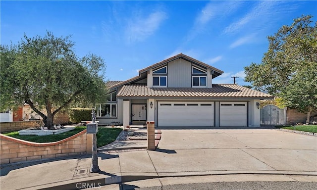 front of property with a garage