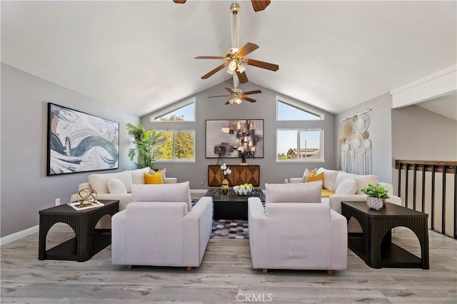 living room with vaulted ceiling, ceiling fan, and light hardwood / wood-style floors