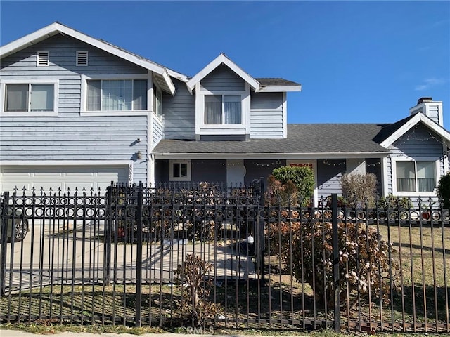 view of front of house with a garage