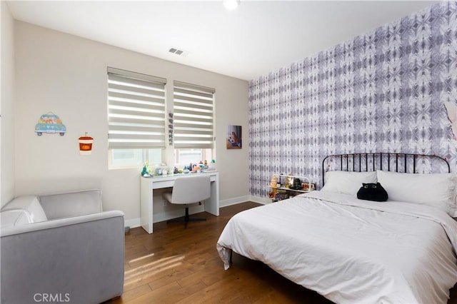 bedroom featuring dark hardwood / wood-style floors