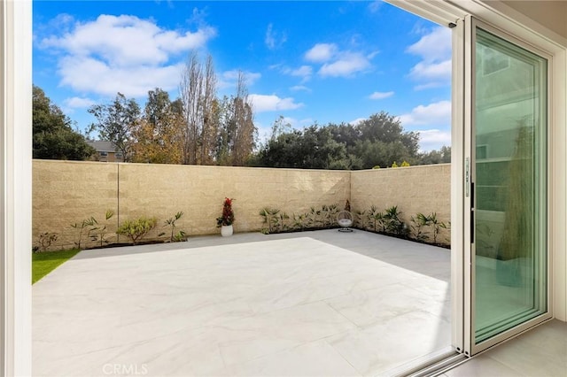 view of patio featuring a fenced backyard