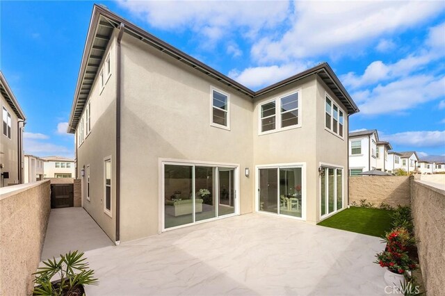 rear view of house with a patio area