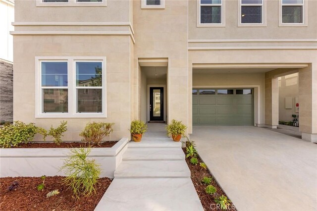 property entrance featuring a garage