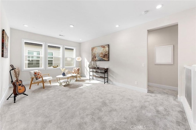 unfurnished room featuring light colored carpet