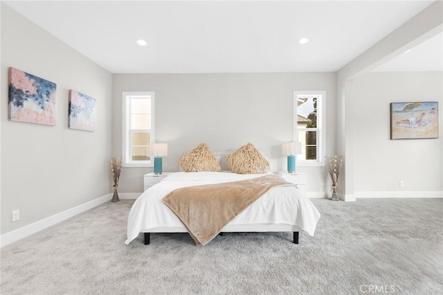 bedroom with recessed lighting, carpet, and baseboards