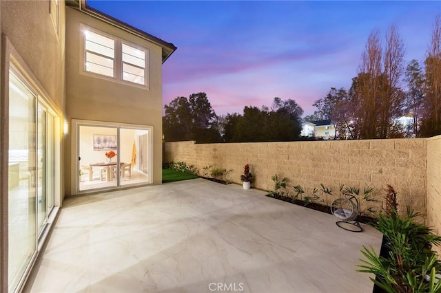 view of patio with fence